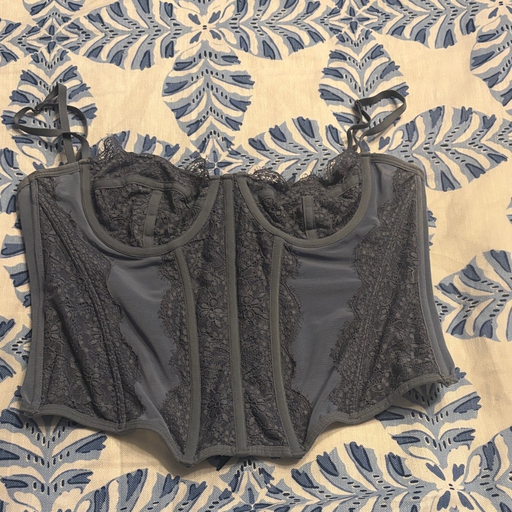 Out from under blue lacey corset top